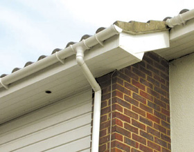 White roof gutter, fascia, soffit and downpipe