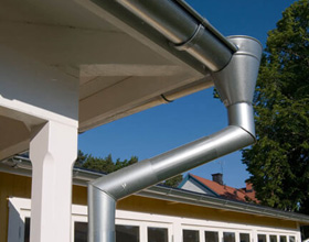 Metal roof gutter and pipe